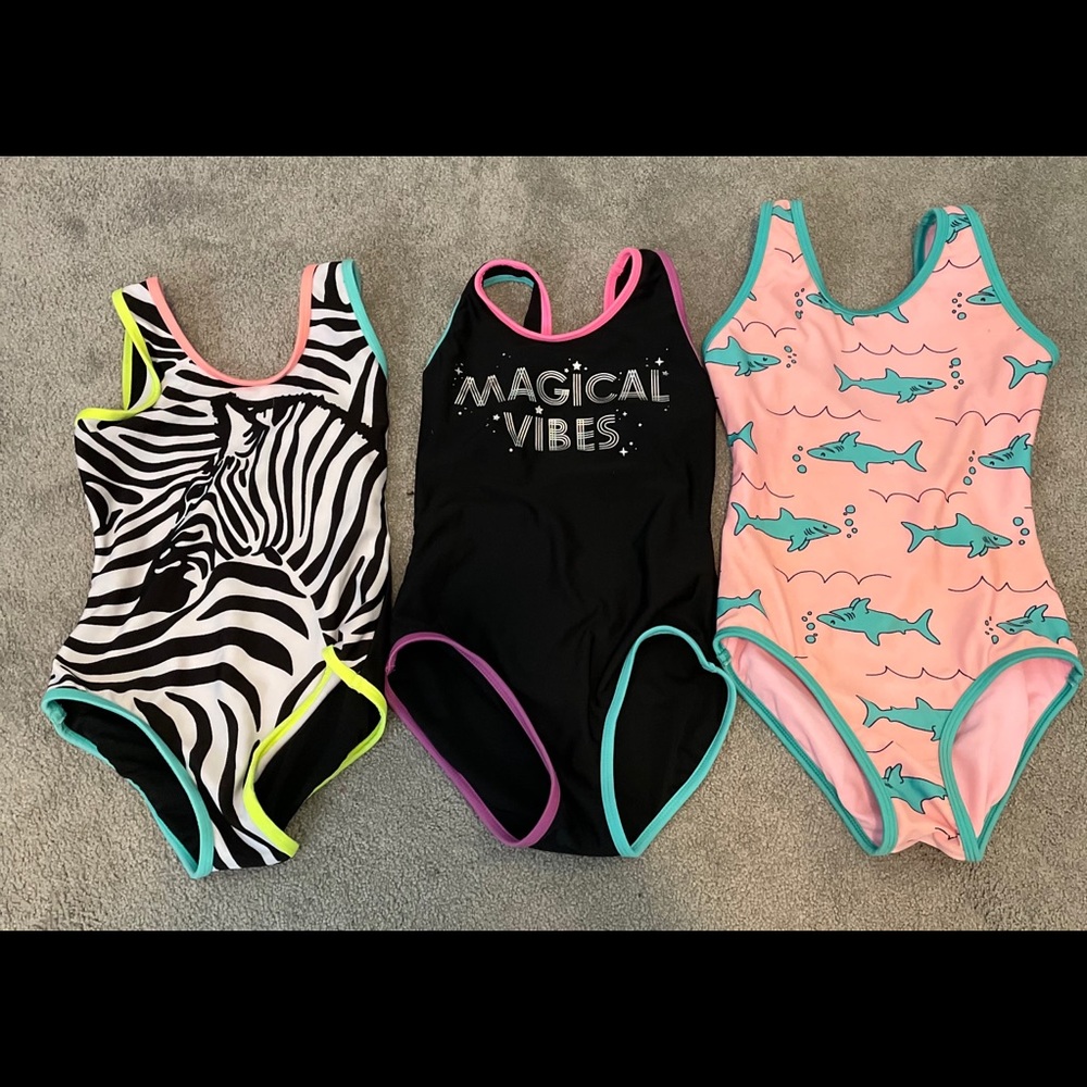 Lot three girls one piece bathing suit. Target.